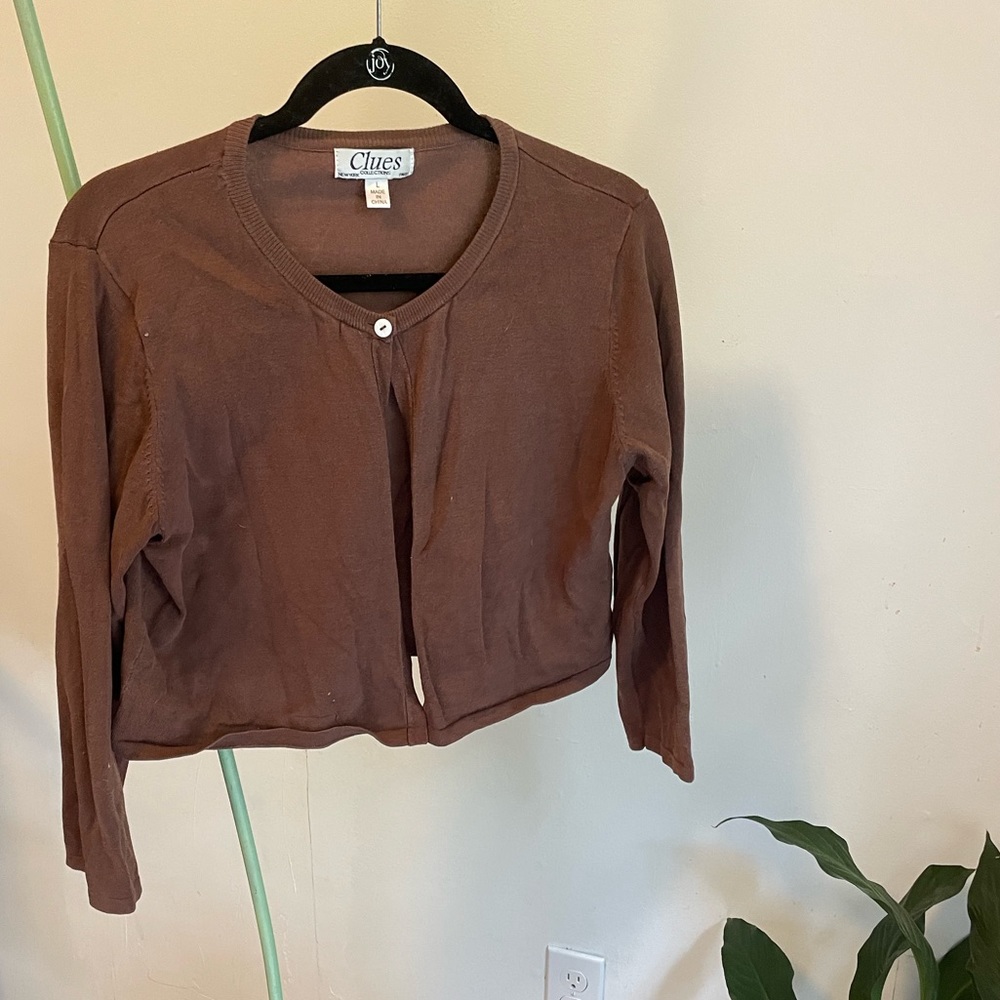 Cropped mid length sleeved sweater great with summer dress.